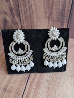White and silver chandelier earrings with pearl details